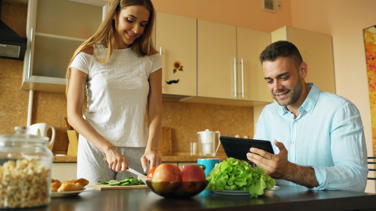 Professional meal planning instructor in modern kitchen setting
